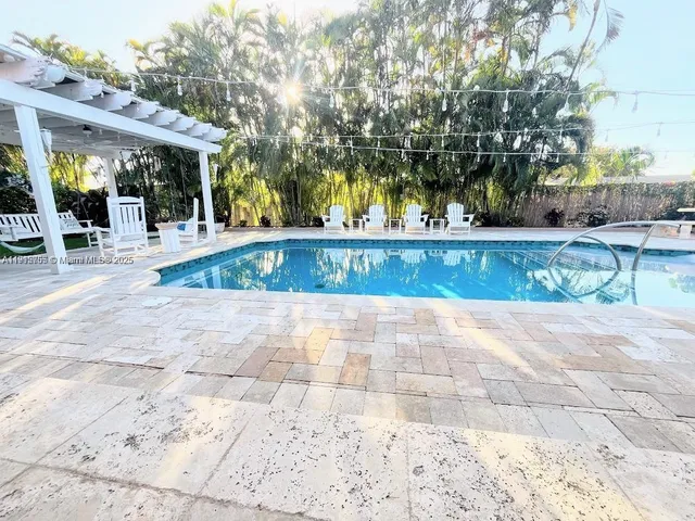 a view of outdoor space with a patio