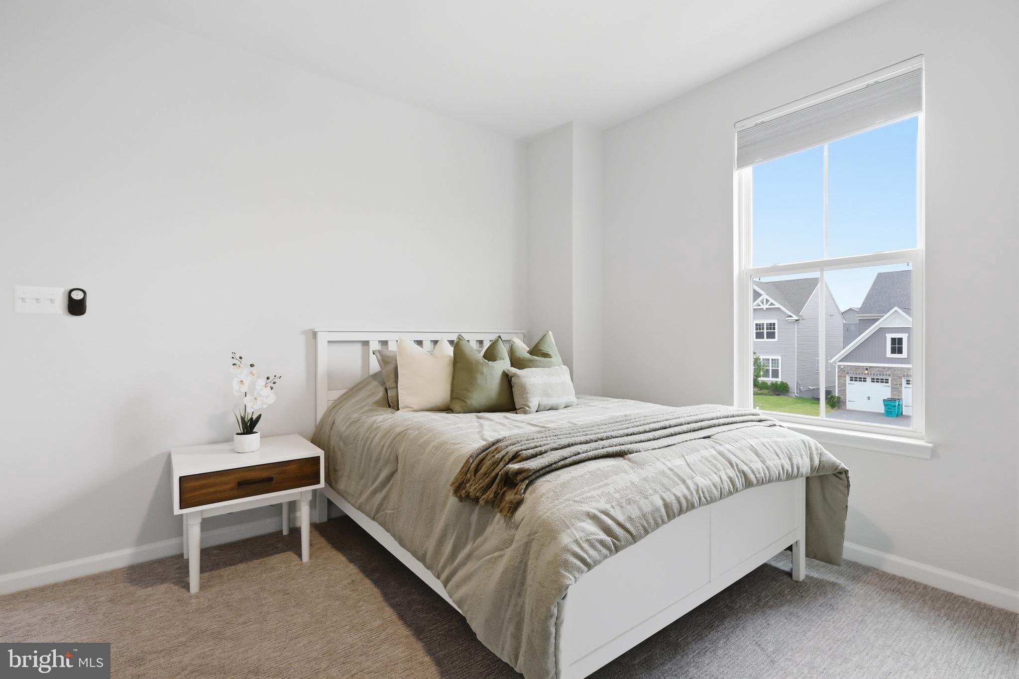 5707 Hawk Ridge Road Frederick, MD 21704 - Photo 53 of 109 a bedroom with a bed and a window