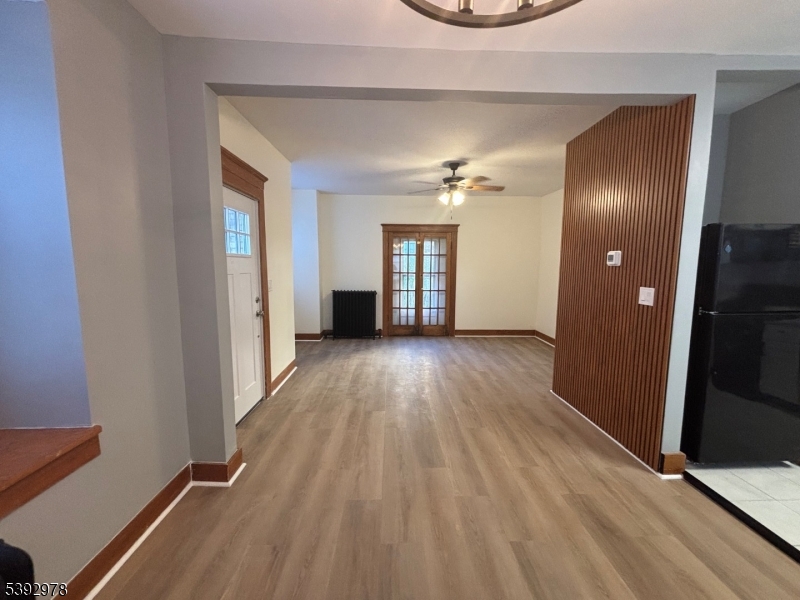 41 Poplar Road Piscataway, NJ 08854 - Photo 12 of 14 wooden floor in an empty room and a gallery