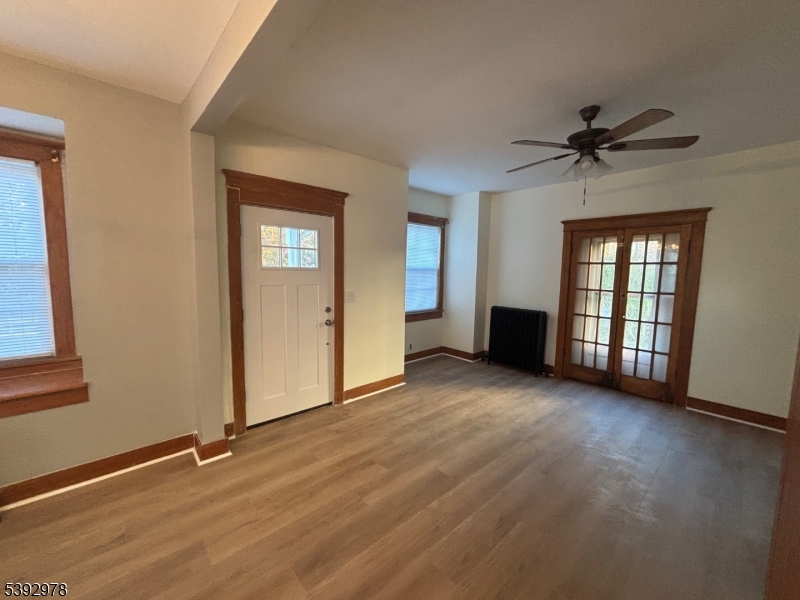 41 Poplar Road Piscataway, NJ 08854 - Photo 14 of 14 wooden floor in an empty room with a window