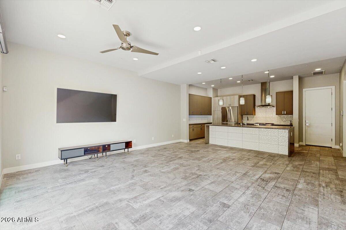 2645 East Osborn Road, Unit 3 Phoenix, AZ 85016 - Photo 2 of 14 a view of kitchen with refrigerator and microwave