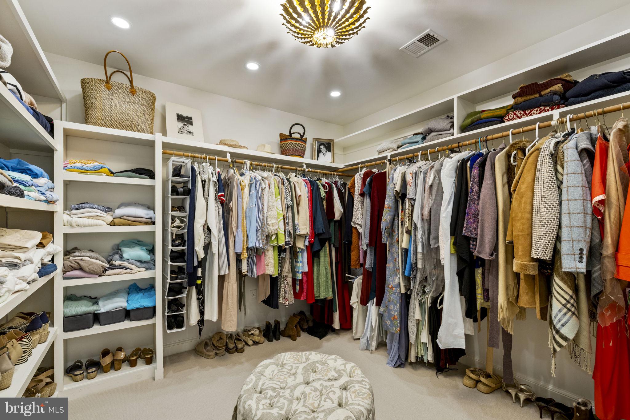 36190 Turkey Roost Road Middleburg, VA 20117 - Photo 48 of 88 a view of walk in closet with clothes and shoes
