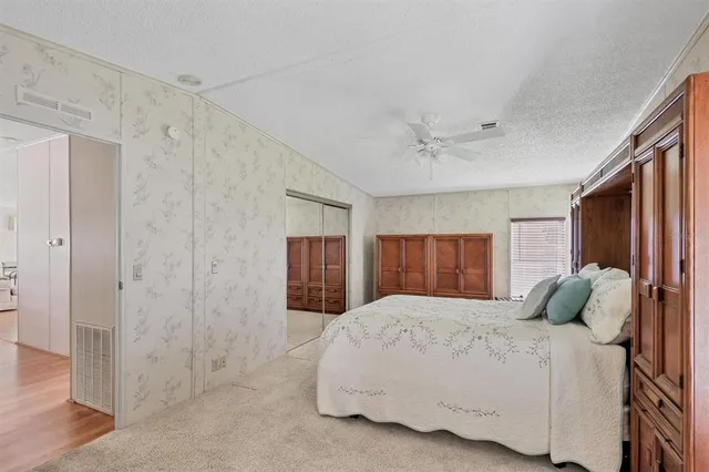 a bathroom with a double vanity sink mirror and