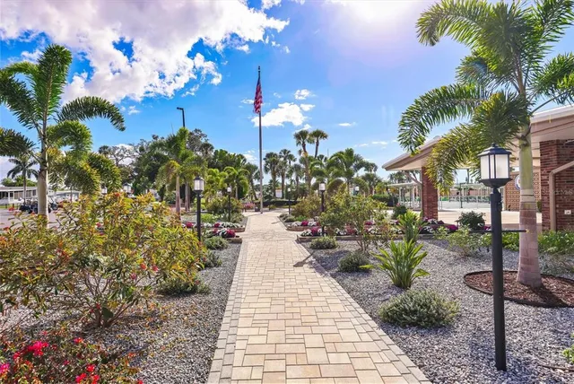 a view of a swimming pool with a patio