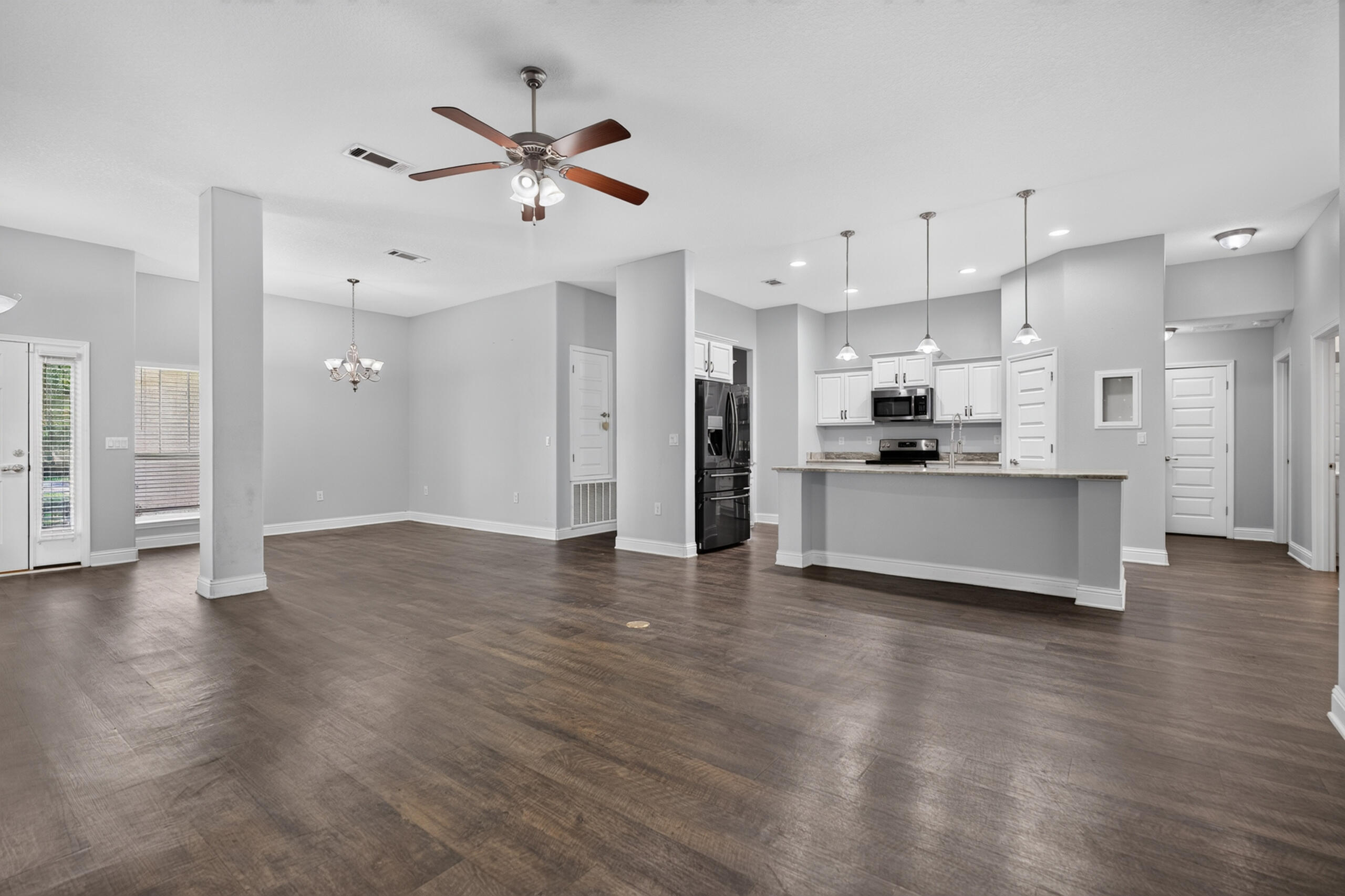 9150 Ridge Road Navarre, FL 32566 - Photo 15 of 66 Living into kitchen