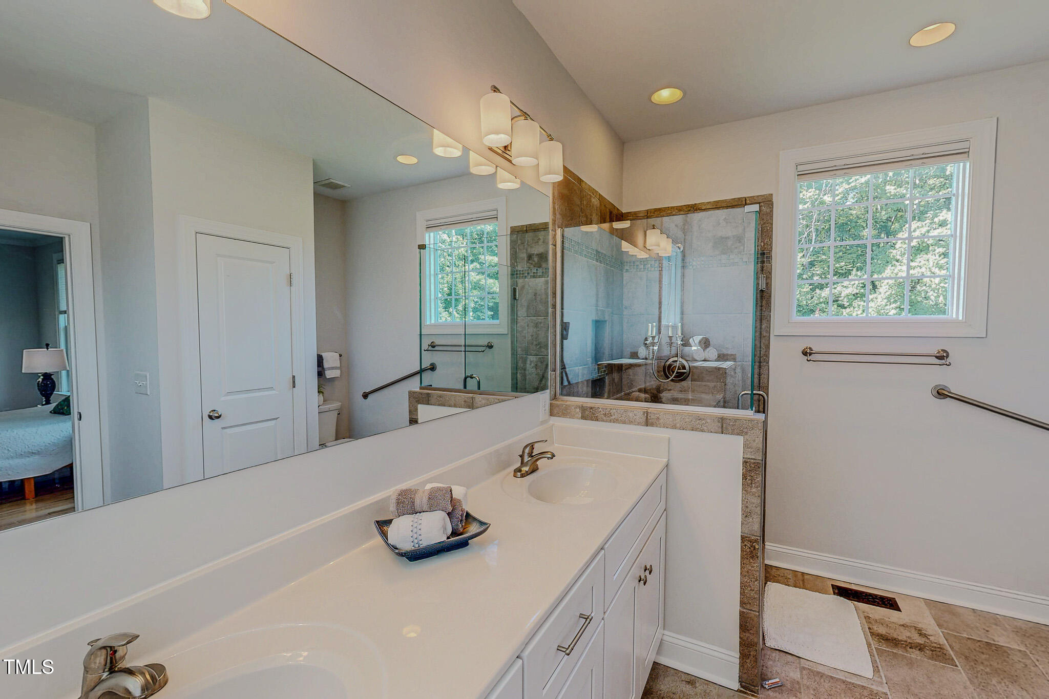 90 South Old Lantern Road Timberlake, NC 27583 - Photo 15 of 63 a bathroom with a tub sink and mirror