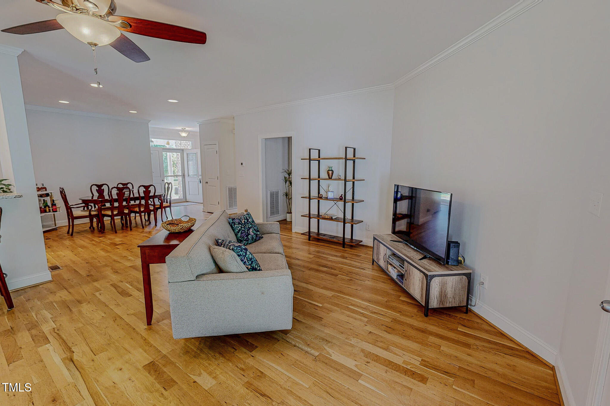 90 South Old Lantern Road Timberlake, NC 27583 - Photo 17 of 63 a living room with furniture and a flat screen tv