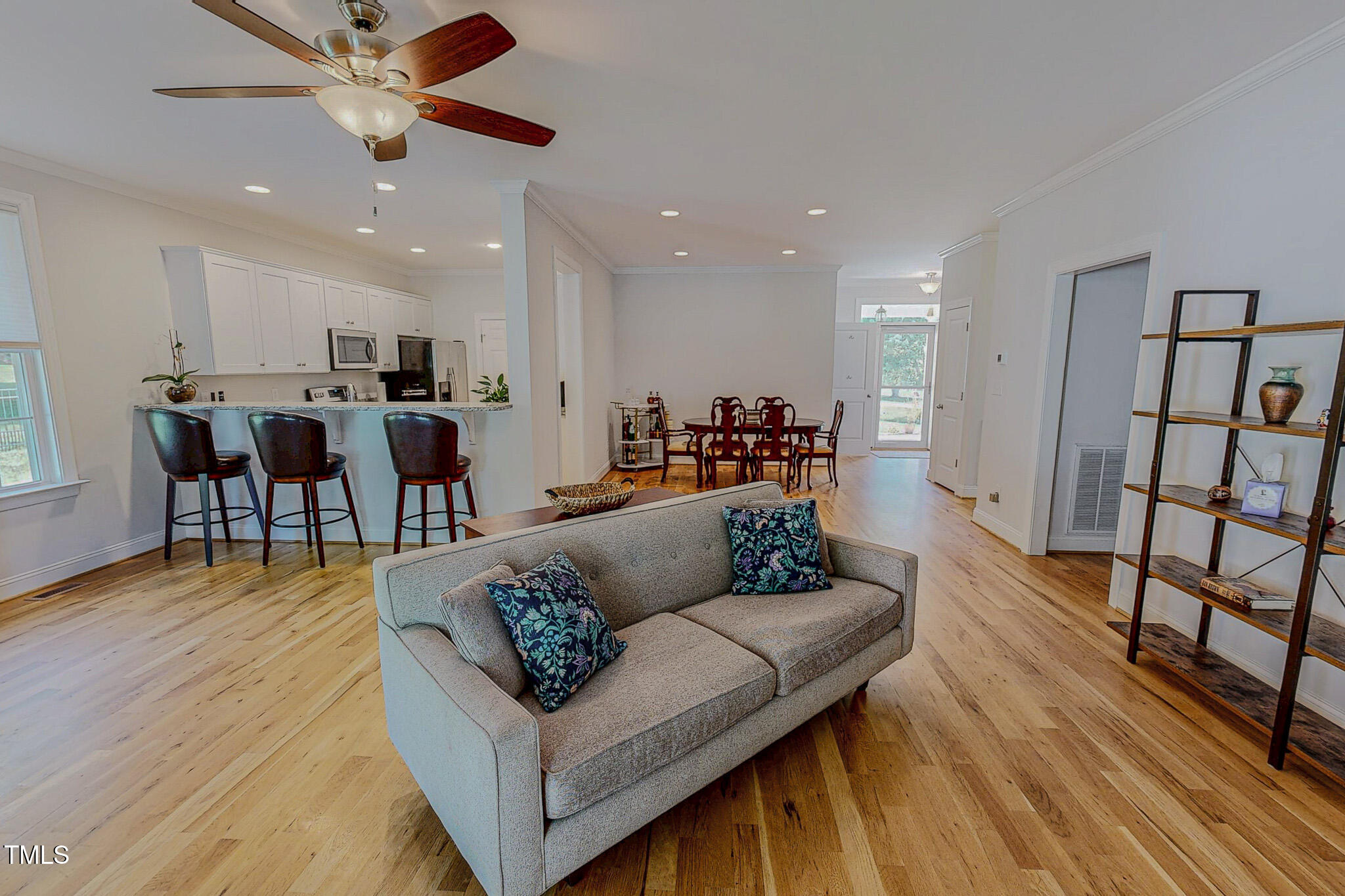 90 South Old Lantern Road Timberlake, NC 27583 - Photo 2 of 63 a living room with furniture kitchen view and a wooden floor