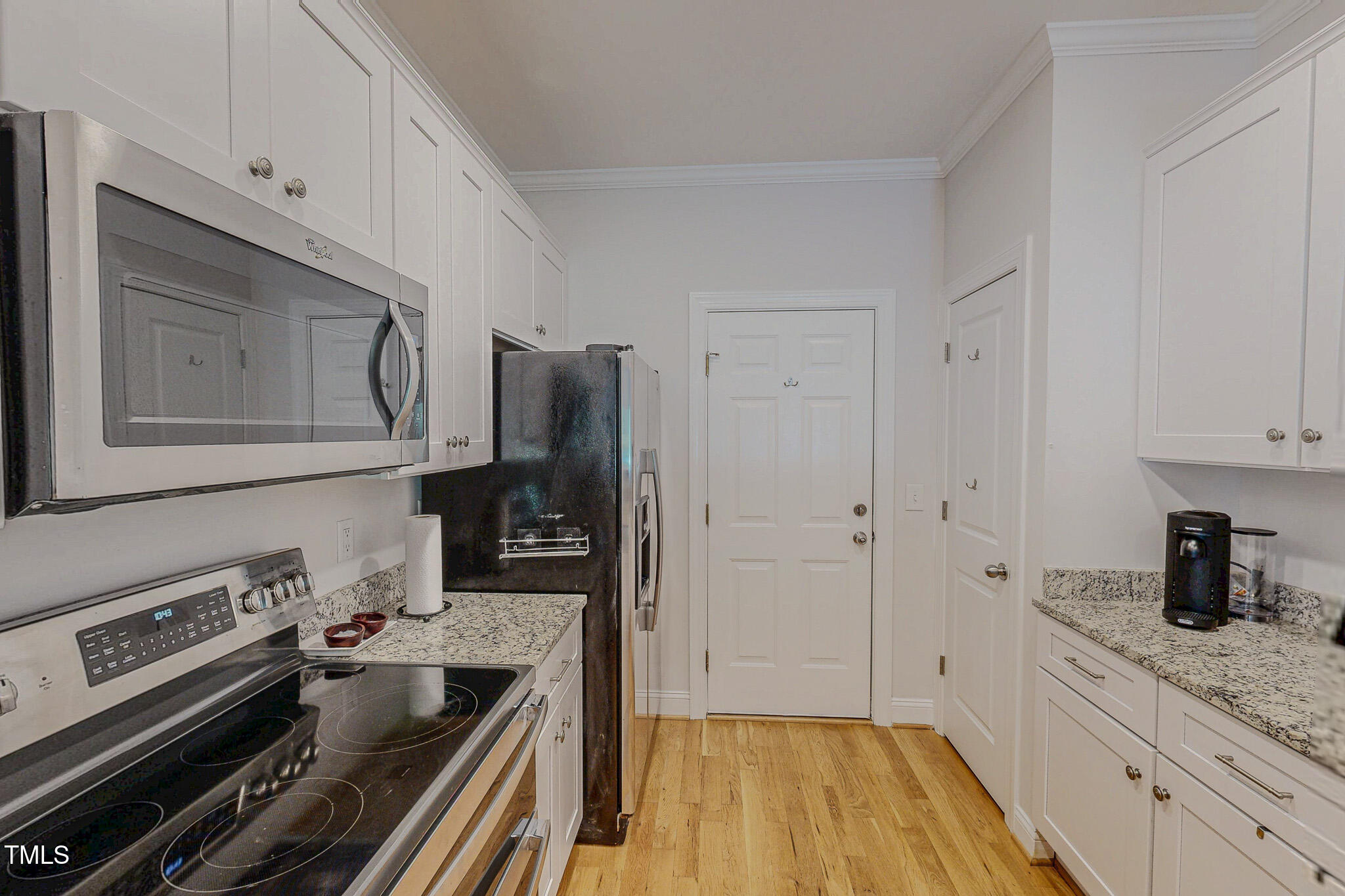 90 South Old Lantern Road Timberlake, NC 27583 - Photo 21 of 63 a kitchen with a refrigerator stove and sink