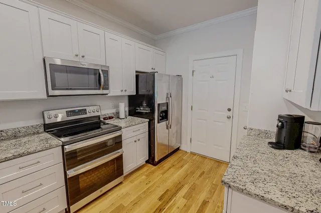 a view of entryway with wooden floor
