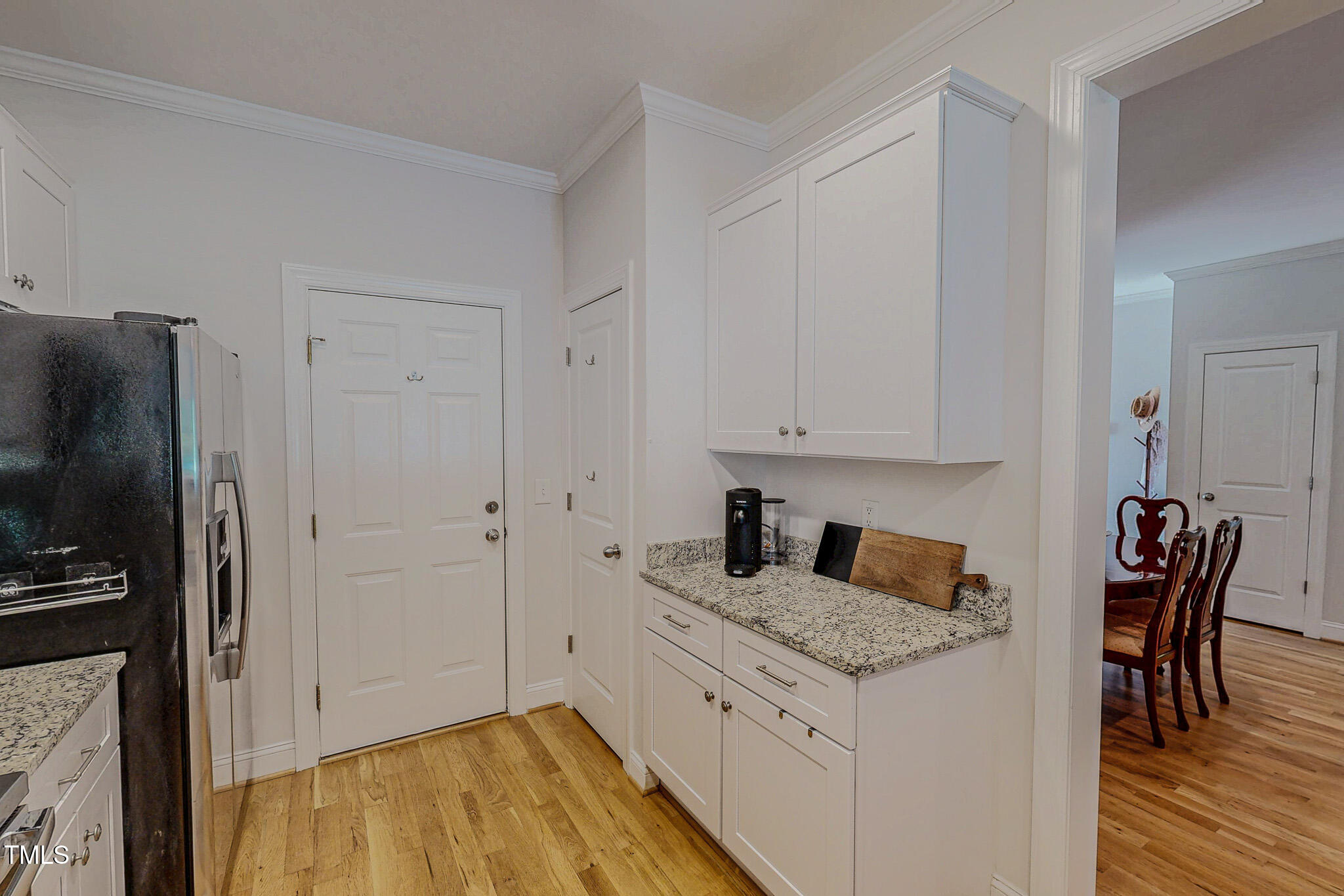 90 South Old Lantern Road Timberlake, NC 27583 - Photo 24 of 63 a kitchen with granite countertop a stove and a refrigerator