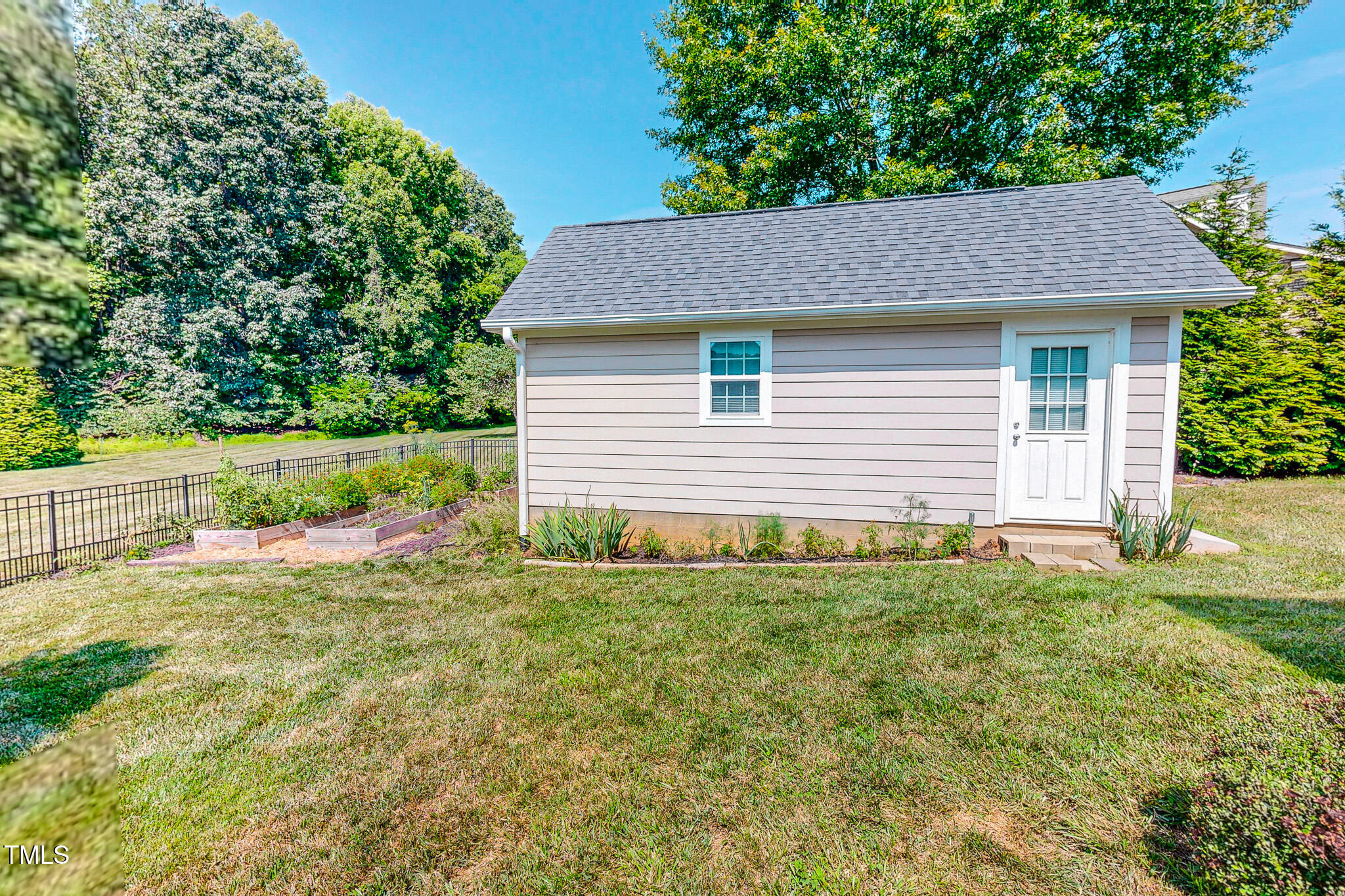 90 South Old Lantern Road Timberlake, NC 27583 - Photo 30 of 63 a house that has a lot of plants in it