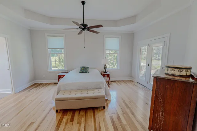 a bathroom with a double vanity sink mirror and shower