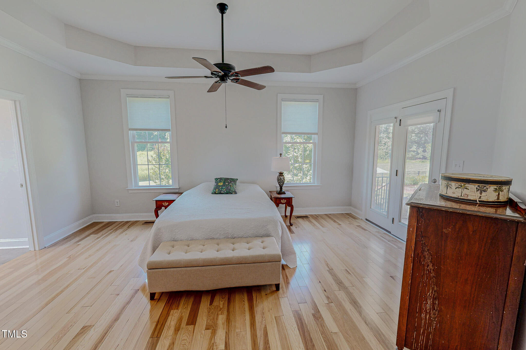 90 South Old Lantern Road Timberlake, NC 27583 - Photo 34 of 63 a bedroom with a bed and wooden floor