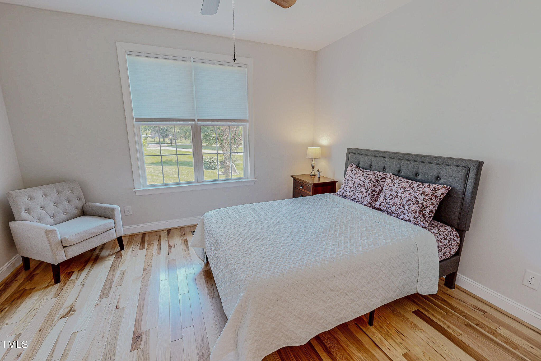 90 South Old Lantern Road Timberlake, NC 27583 - Photo 44 of 63 a bedroom with a bed and a couch