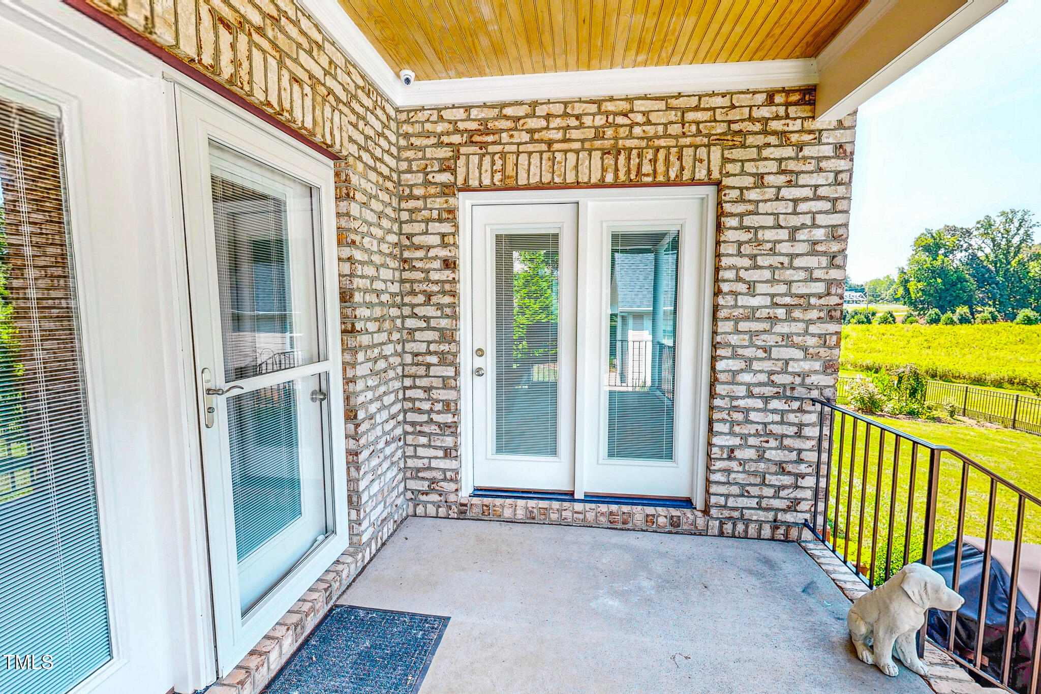 90 South Old Lantern Road Timberlake, NC 27583 - Photo 52 of 63 front view of a house with a glass door