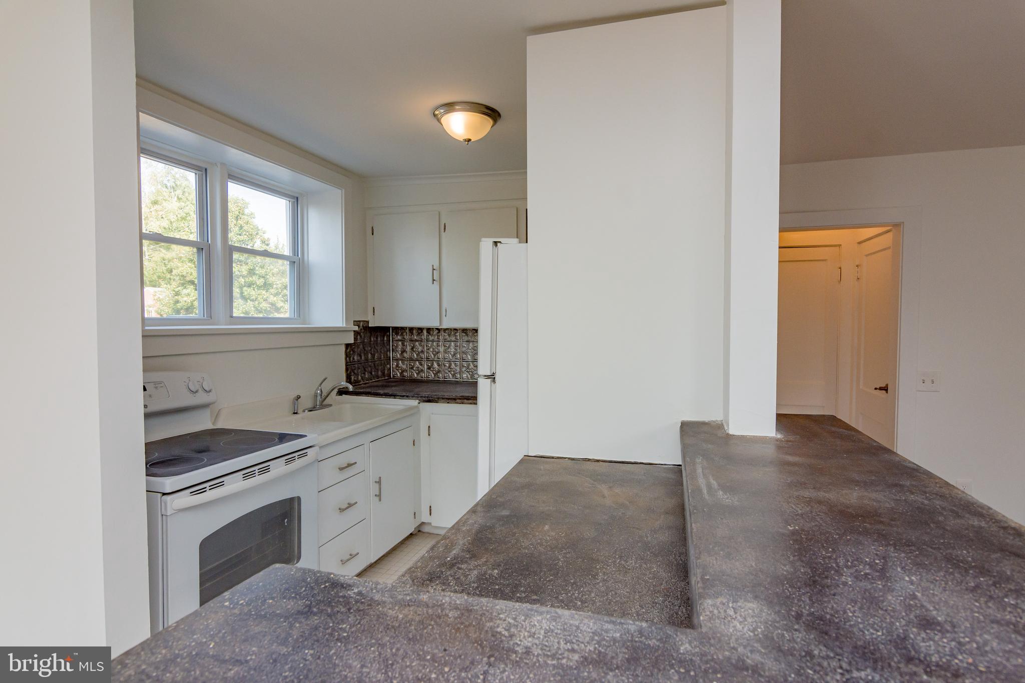 59 North Main Street, Unit 2 Lambertville, NJ 08530 - Photo 7 of 17 kitchen island