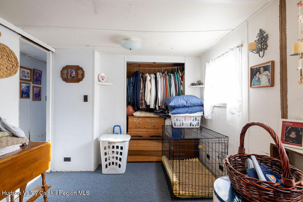 157 Simons Road Ancram, NY 12502 - Photo 12 of 16 a view of entryway with workspace and a couch
