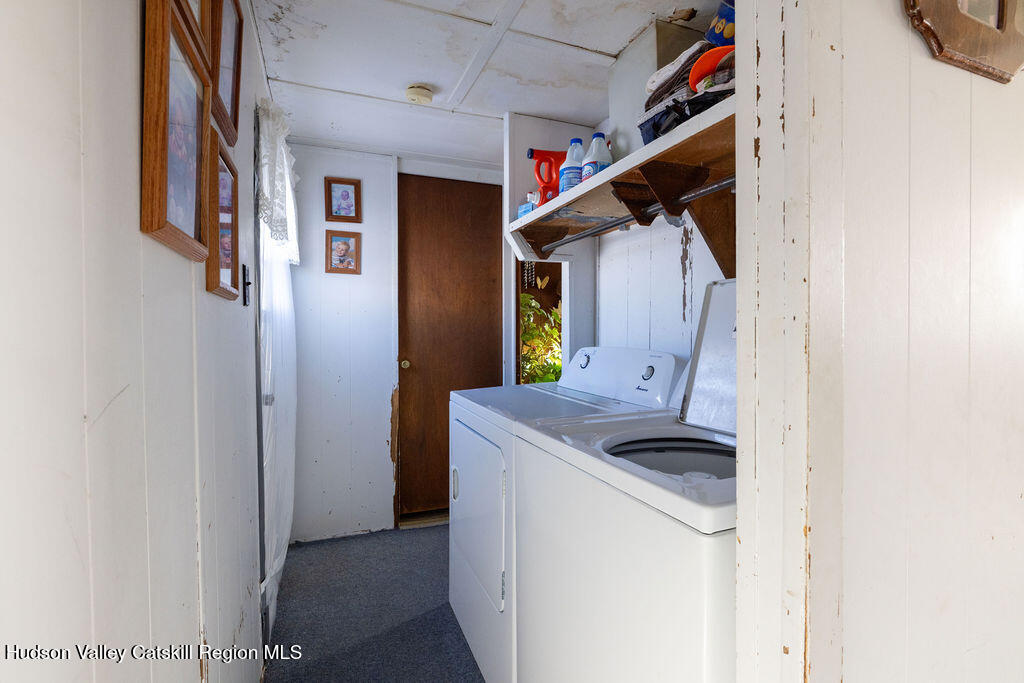 157 Simons Road Ancram, NY 12502 - Photo 15 of 16 a utility room with dryer and washer