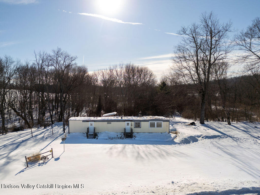 157 Simons Road Ancram, NY 12502 - Photo 2 of 17 a view of a backyard with sitting area