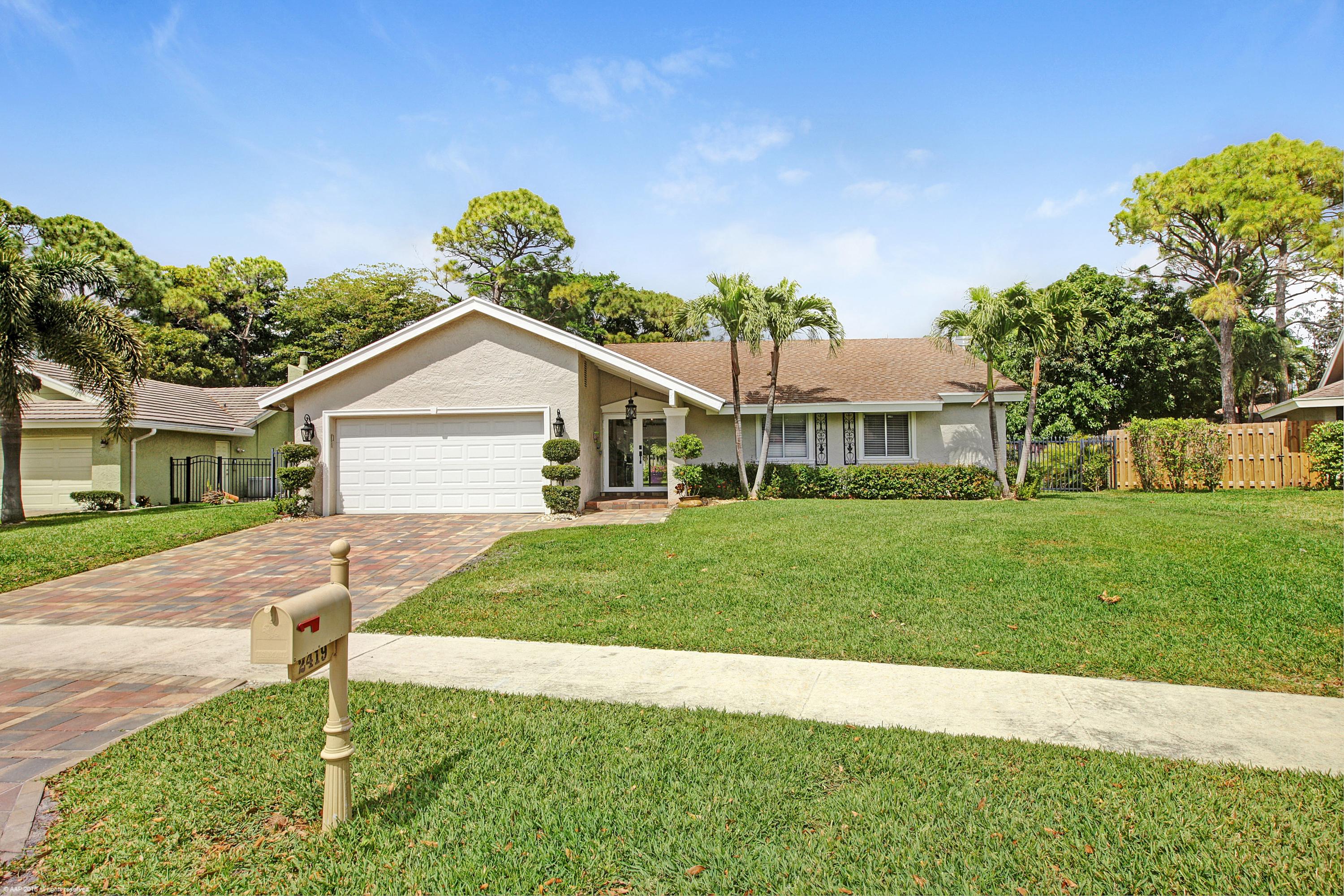2419 Northwest 30th Road Boca Raton, FL 33431 - Photo 1 of 29 006