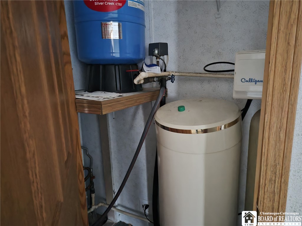 5743 Stockton-Hartfield Road Chautauqua, NY 14728 - Photo 20 of 24 Culligan water filtration and water pump
