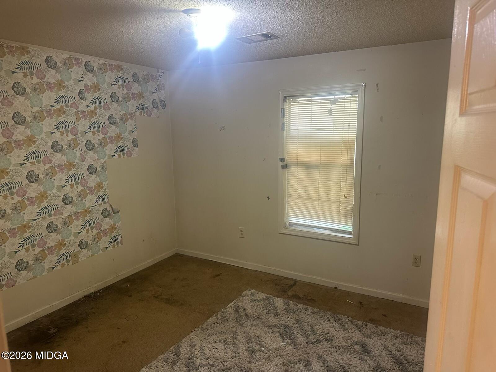 682 Wilderness Drive Macon, GA 31220 - Photo 10 of 25 a view of a room that has a window in it