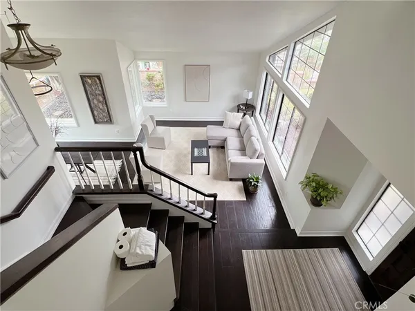 a view of an entryway and wooden floor