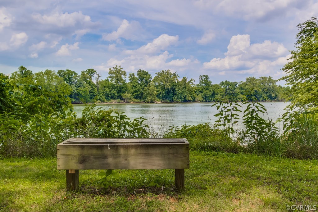 4021 East Old Gun Road Midlothian, VA 23113 - Photo 11 of 12 a view of a lake from a yard