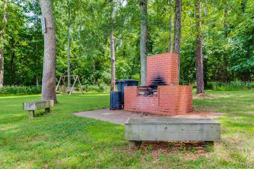 4021 East Old Gun Road Midlothian, VA 23113 - Photo 7 of 12 a garden view with a seating space