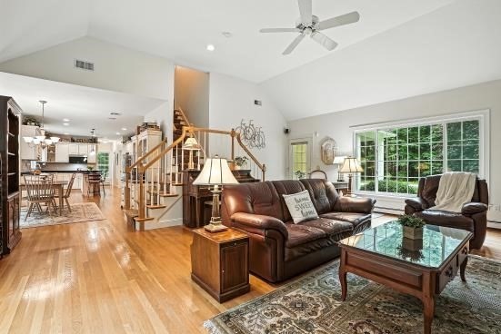 8 Miscoe Hill Road Upton, MA 01568 - Photo 20 of 40 a living room with furniture and wooden floor