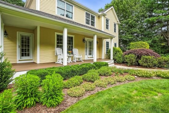 8 Miscoe Hill Road Upton, MA 01568 - Photo 2 of 40 front view of a house with a yard
