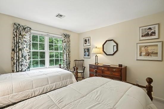 8 Miscoe Hill Road Upton, MA 01568 - Photo 29 of 40 a bedroom with bed and a window