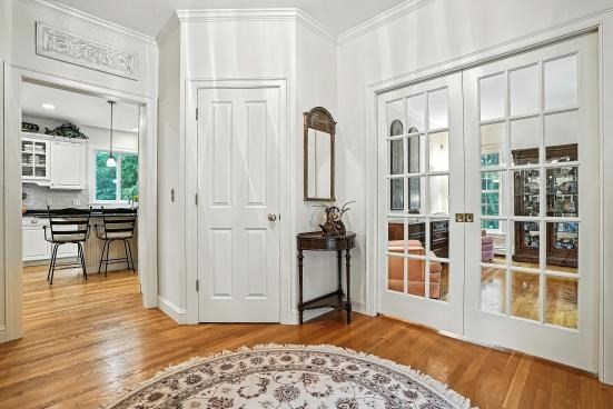 8 Miscoe Hill Road Upton, MA 01568 - Photo 3 of 40 a view of a bedroom with furniture and window
