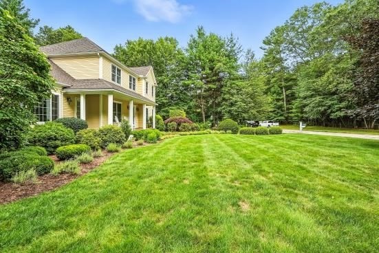 8 Miscoe Hill Road Upton, MA 01568 - Photo 31 of 40 a view of a big yard with plants and large trees