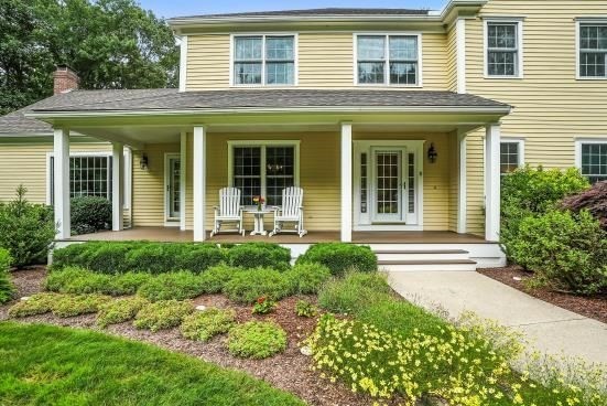 8 Miscoe Hill Road Upton, MA 01568 - Photo 34 of 40 front view of a brick house with a large window