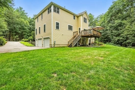 8 Miscoe Hill Road Upton, MA 01568 - Photo 37 of 40 a view of a house with a yard