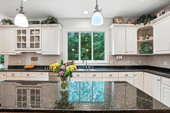 8 Miscoe Hill Road Upton, MA 01568 - Photo 6 of 40 a kitchen with stainless steel appliances granite countertop a stove a sink and a granite counter tops