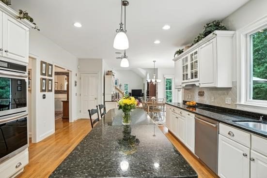 8 Miscoe Hill Road Upton, MA 01568 - Photo 8 of 40 a large kitchen with lots of counter space and stainless steel appliances