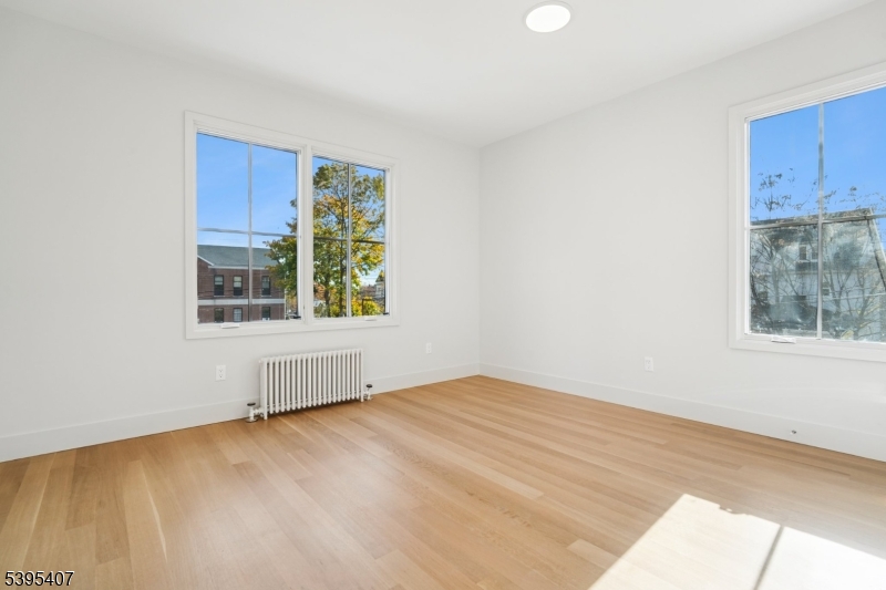 75 Midland Avenue, Unit 2 Montclair, NJ 07042 - Photo 11 of 18 a view of an empty room with a window