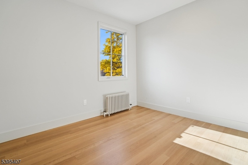 75 Midland Avenue, Unit 2 Montclair, NJ 07042 - Photo 15 of 18 a view of an empty room with a window