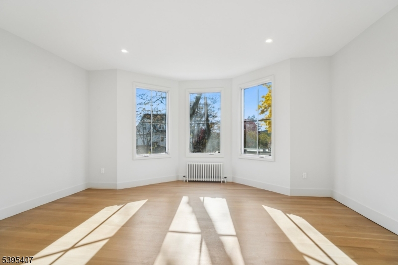 75 Midland Avenue, Unit 2 Montclair, NJ 07042 - Photo 5 of 18 a view of an empty room with a window