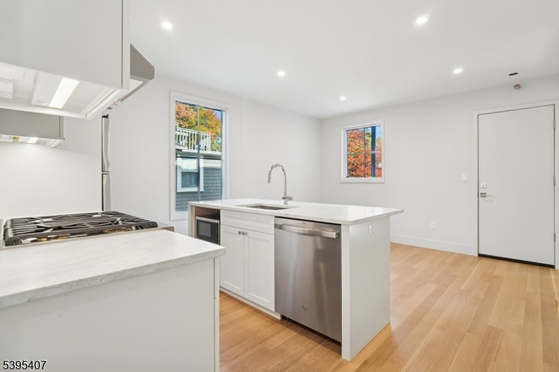 75 Midland Avenue, Unit 2 Montclair, NJ 07042 - Photo 7 of 18 a kitchen with a stove and a sink