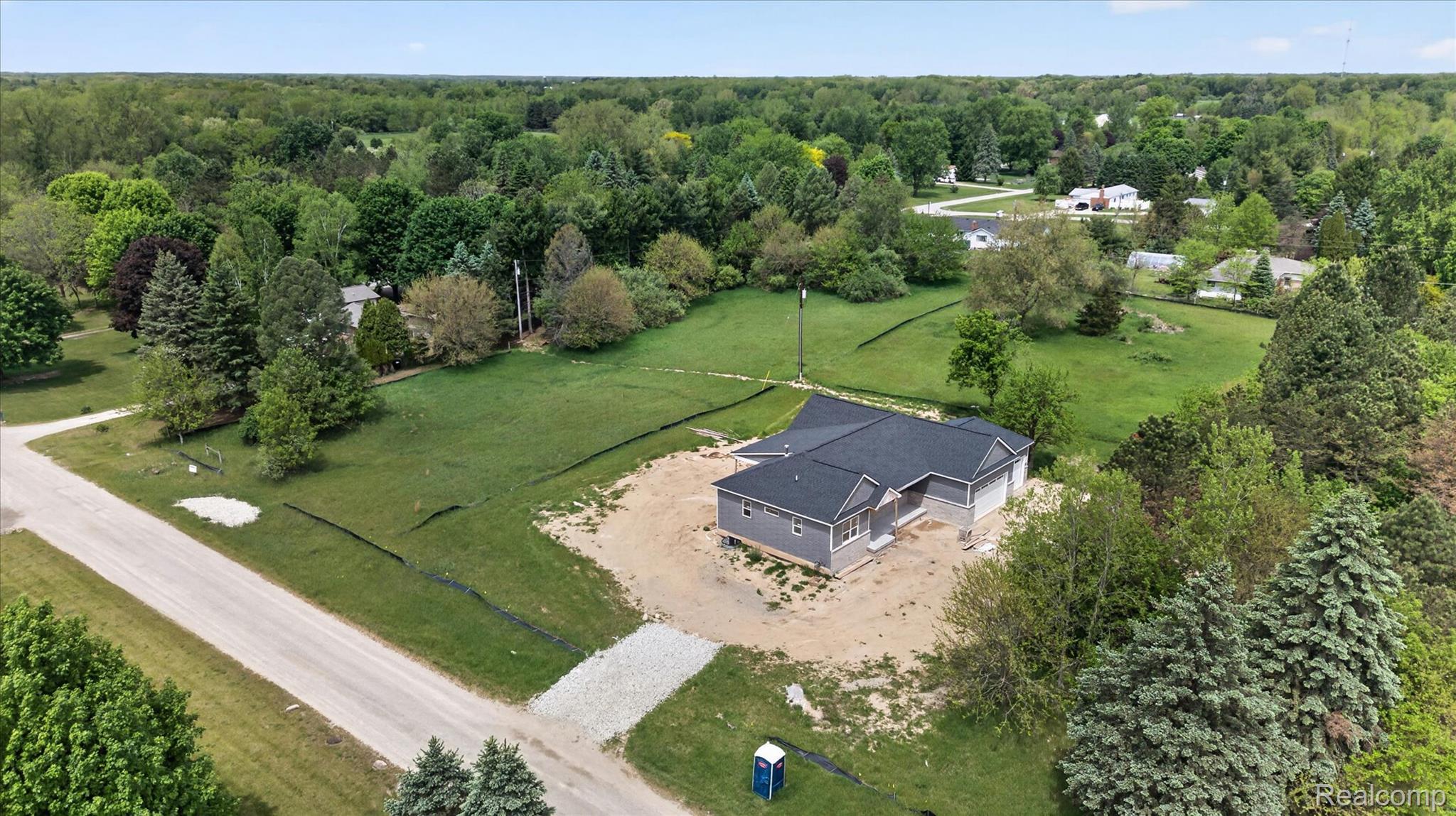 3297 Oak Grove Road Howell, MI 48855 - Photo 27 of 40 Private backyard with room to create your ideal outdoor retreat.
