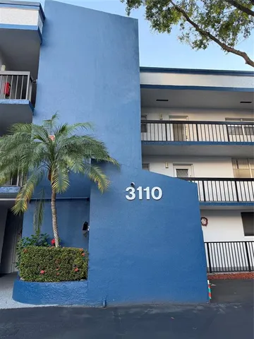 a sign that is on the side of a building