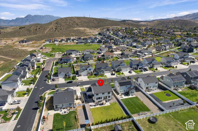 7939 Seattle Slew Road Eagle Mountain, UT 84005 - Photo 49 of 52 Residential neighborhood with mountain backdrop