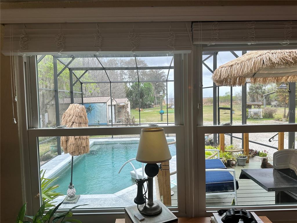 357 Magnolia Place DeBary, FL 32713 - Photo 18 of 50 a living room with furniture and a window