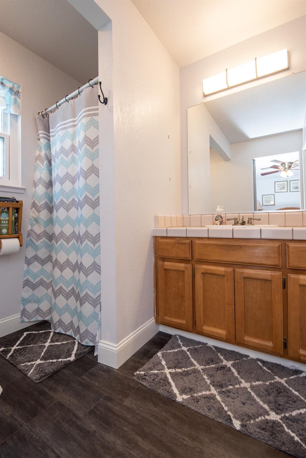 301 Goldrun Drive Modesto, CA 95354 - Photo 11 of 20 a room with a sink and cabinets