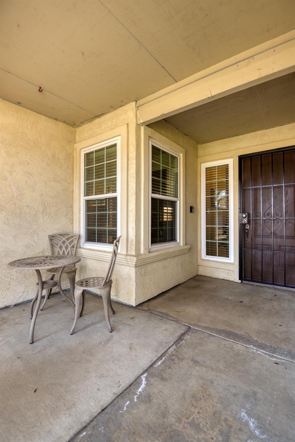 301 Goldrun Drive Modesto, CA 95354 - Photo 2 of 20 a view of house with backyard and outdoor seating
