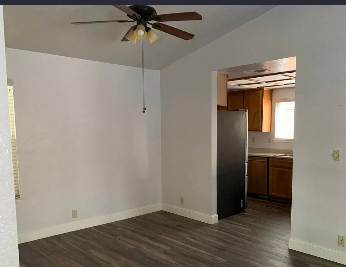 301 Goldrun Drive Modesto, CA 95354 - Photo 10 of 20 an empty room with wooden floor closet and windows